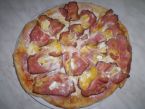 Kynutá pizza co dům dal